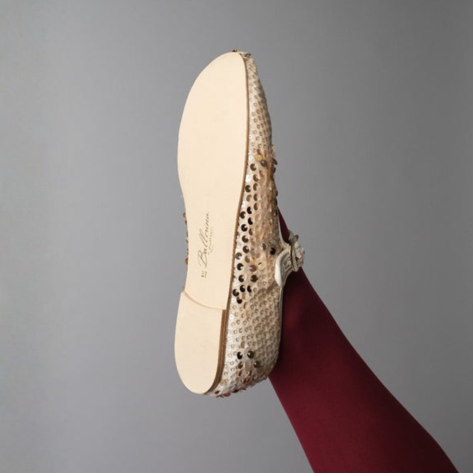 Close-up of a ballerina neolite sole dance shoe with a gray background